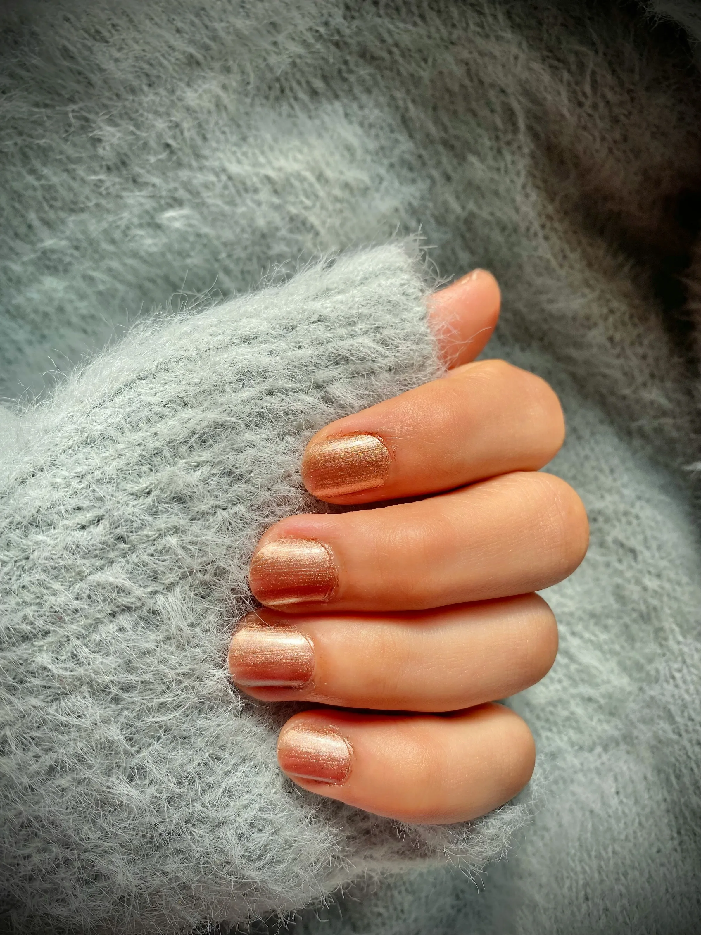 Reflective mirror gold chrome gel finish on neat natural nails